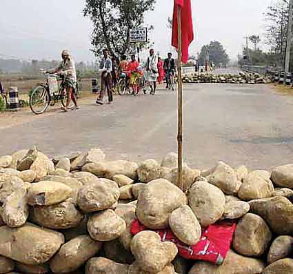 Maoists put stones and logs on Daldale Bridge at Butwal-Narayanghat section of Mahendra Highway.