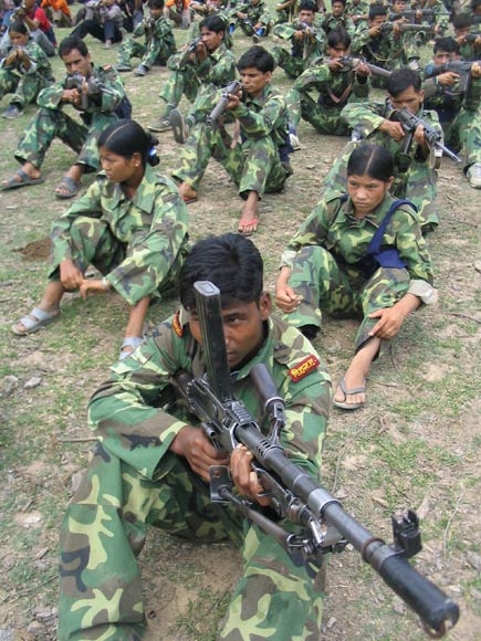 Maoist guerilla pointing guns