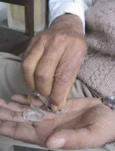 Hutaram Baidya and his hearing aid device
