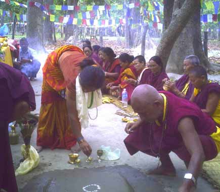 Performing Pooja in the meditating are praying for Little Buddha's safe and sound return