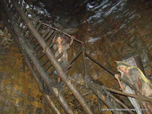 Ladrampai, Meghalaya coal mine labourers climbing a ladder