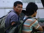 nepalis in banbasa waiting for a bus to delhi